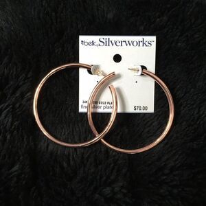24K rose gold plated hoop earrings. NWT